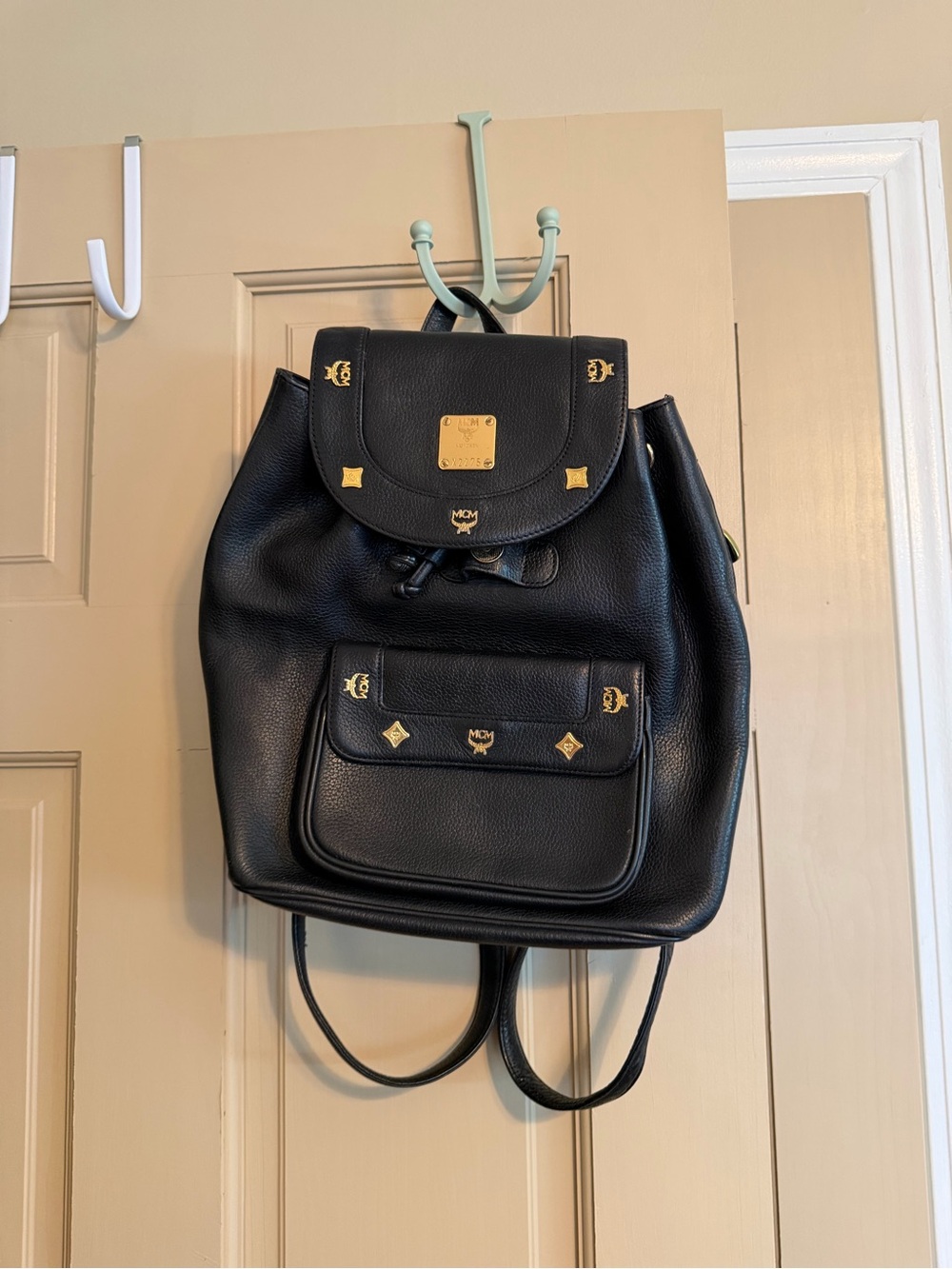 MCM Black Pebbled Leather Backpack with Gold Accents